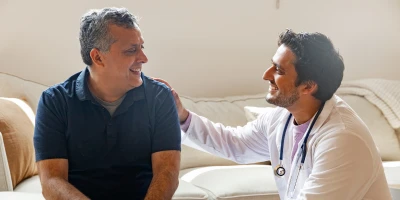physician having a conversation with a patient