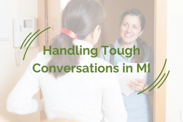 Healthcare provider listening empathetically to a patient during a conversation.