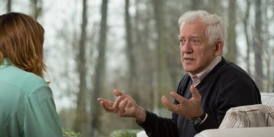man talking with an expression of confusion